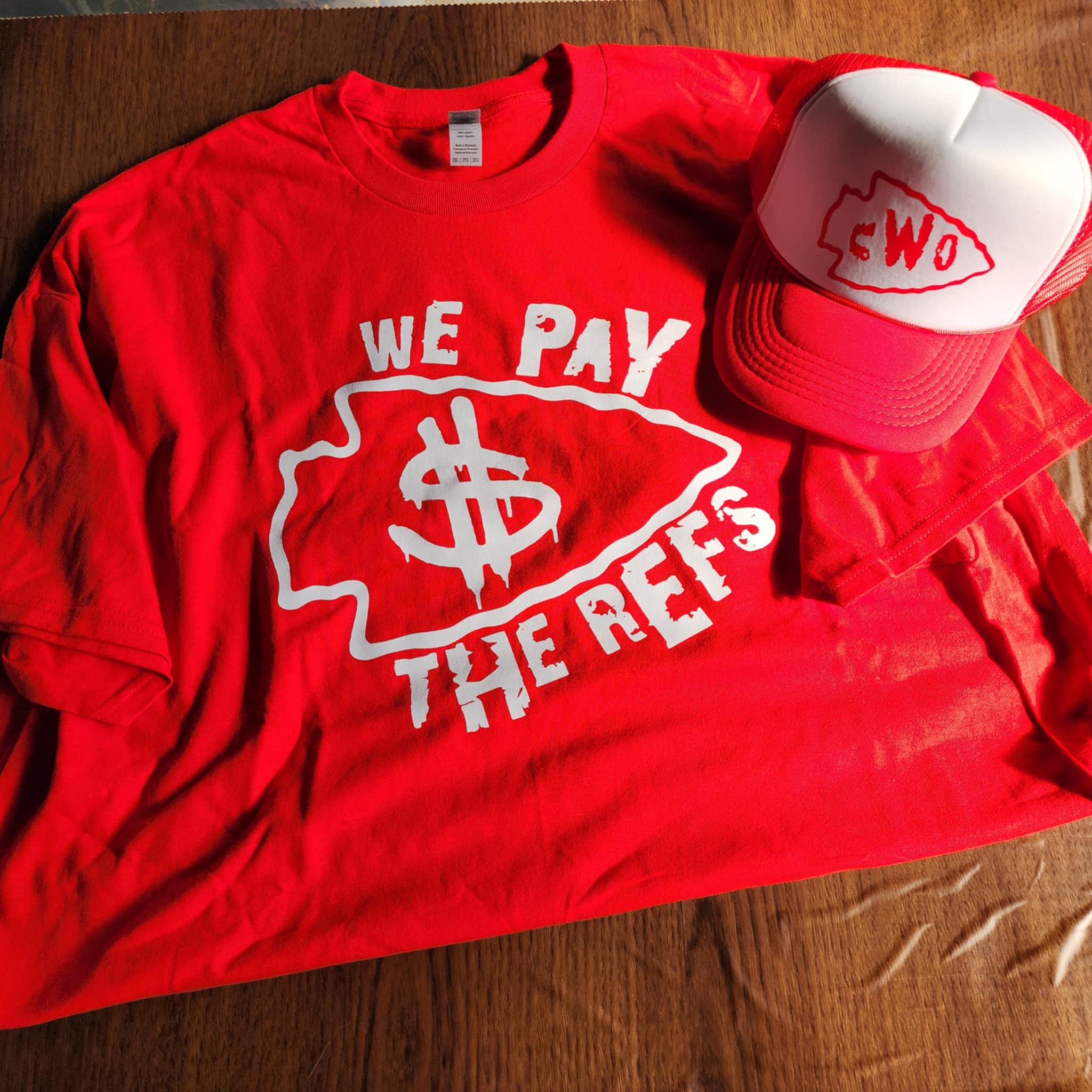 White We Pay The Refs on Red Shirt
